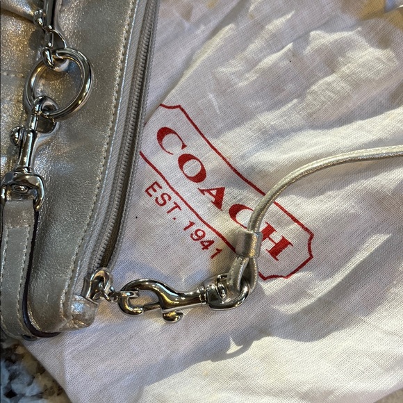 Coach Silver leather wristlet. Pre-Owned Condition-Very Good. - Picture 5 of 9